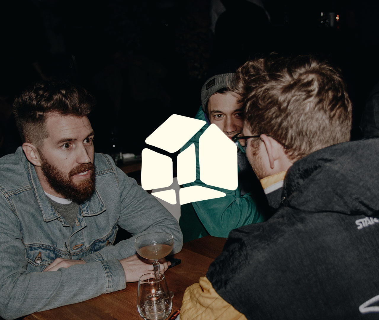 Image of Pangea logo on images of three people eating dinner.